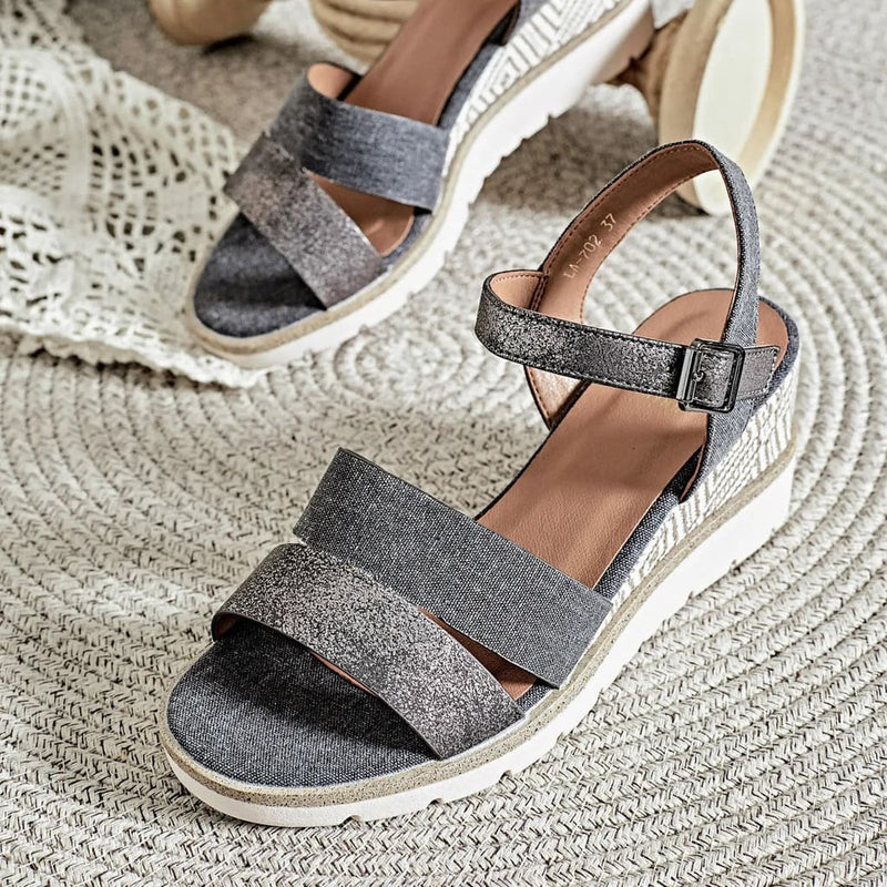 Sandales compensées noires femme avec lanières pailletées et semelle tressée - Tendances